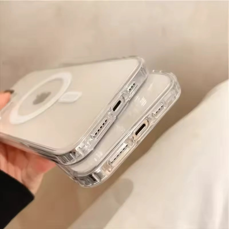 Clear phone case held by a hand against a neutral background
